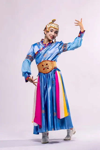 Mongolian dancer in a blue traditional costume