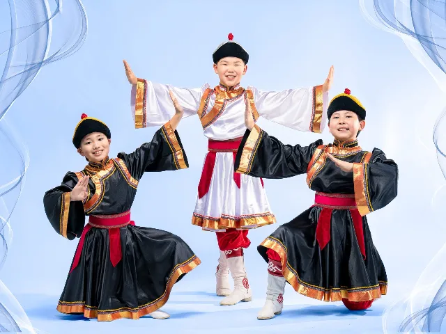 Young performers in coordinated Mongolian dance costumes