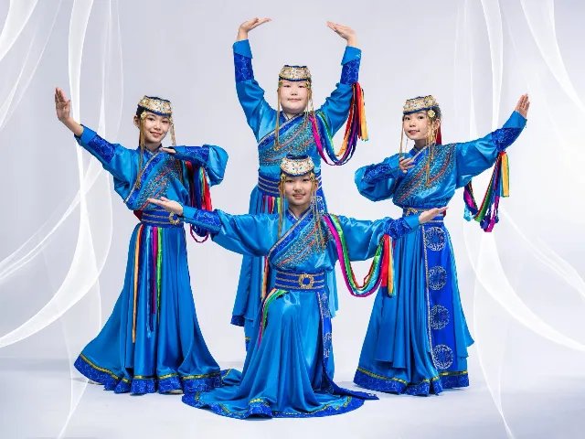 Mongolian dance ensemble in blue traditional dress